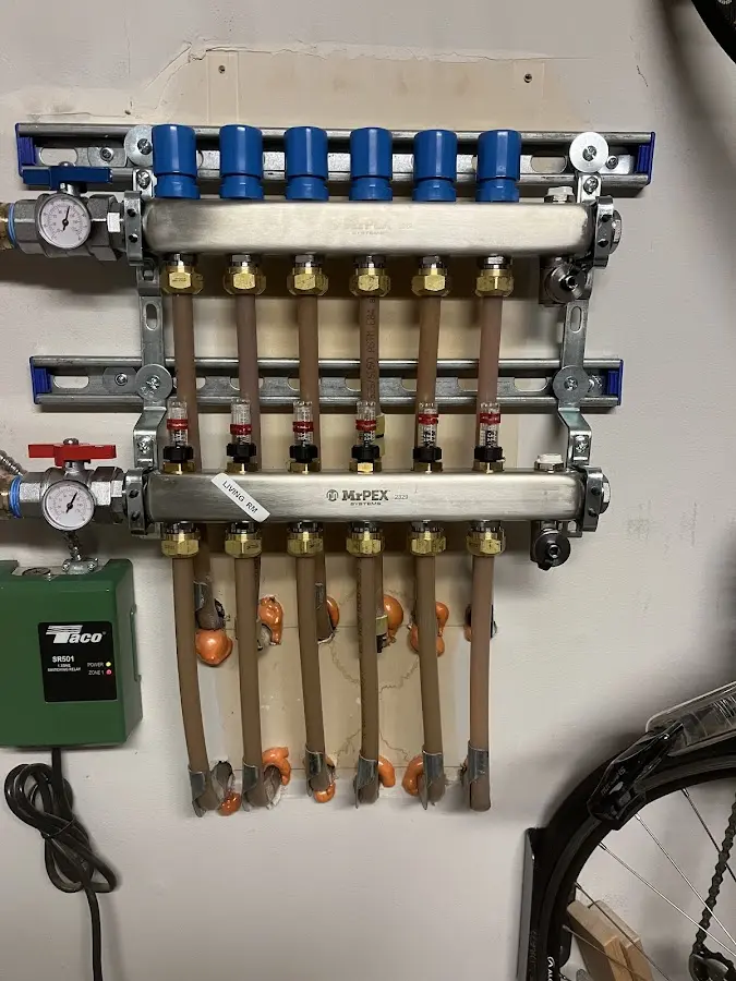 Plumber performing Gas Line Installation at a residential property in Swanton